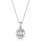 Silver chain necklace with round diamond pendant, faceted border and geometric center design